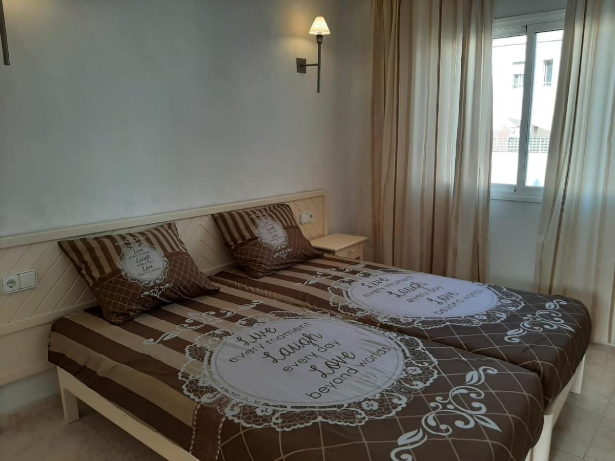 Apartamentos Torres Cardona Кала-Лонга Экстерьер фото