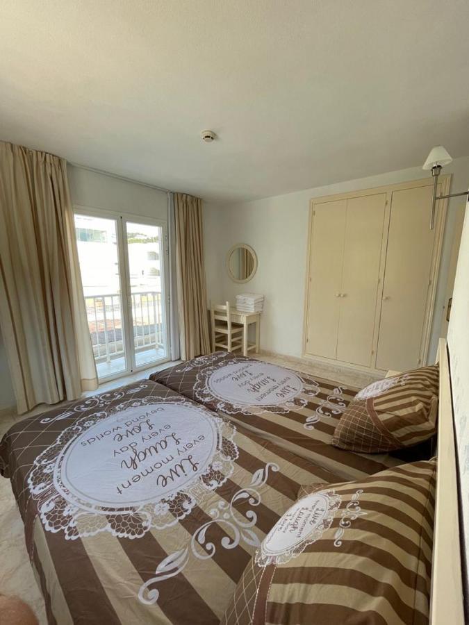 Apartamentos Torres Cardona Кала-Лонга Экстерьер фото